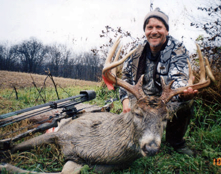 The sheriff poses with an 11-point buck he shot in 2000. In addition to being a sheriff and running his own taxidermy business, Trawicki is an avid big game hunter. Photo courtesy of Buffalo County Outfitters.