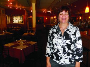 Chef Jan Kelly poses in her restaurant