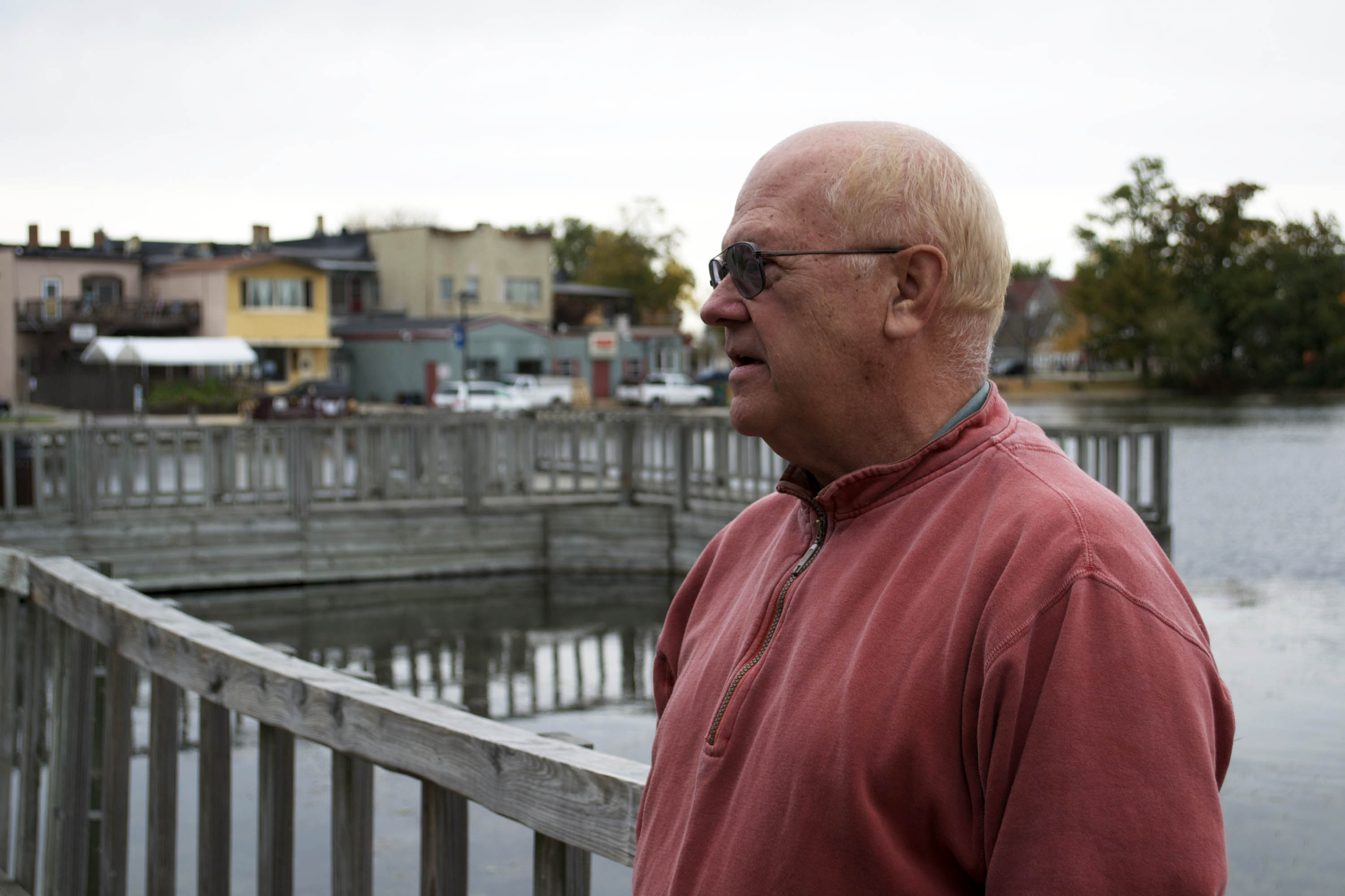Dick Pas, the chairman for Waukesha County's democratic party, stands by the lake outside his favorite cafe in Oconomowoc.
Photo by: Sam Easton