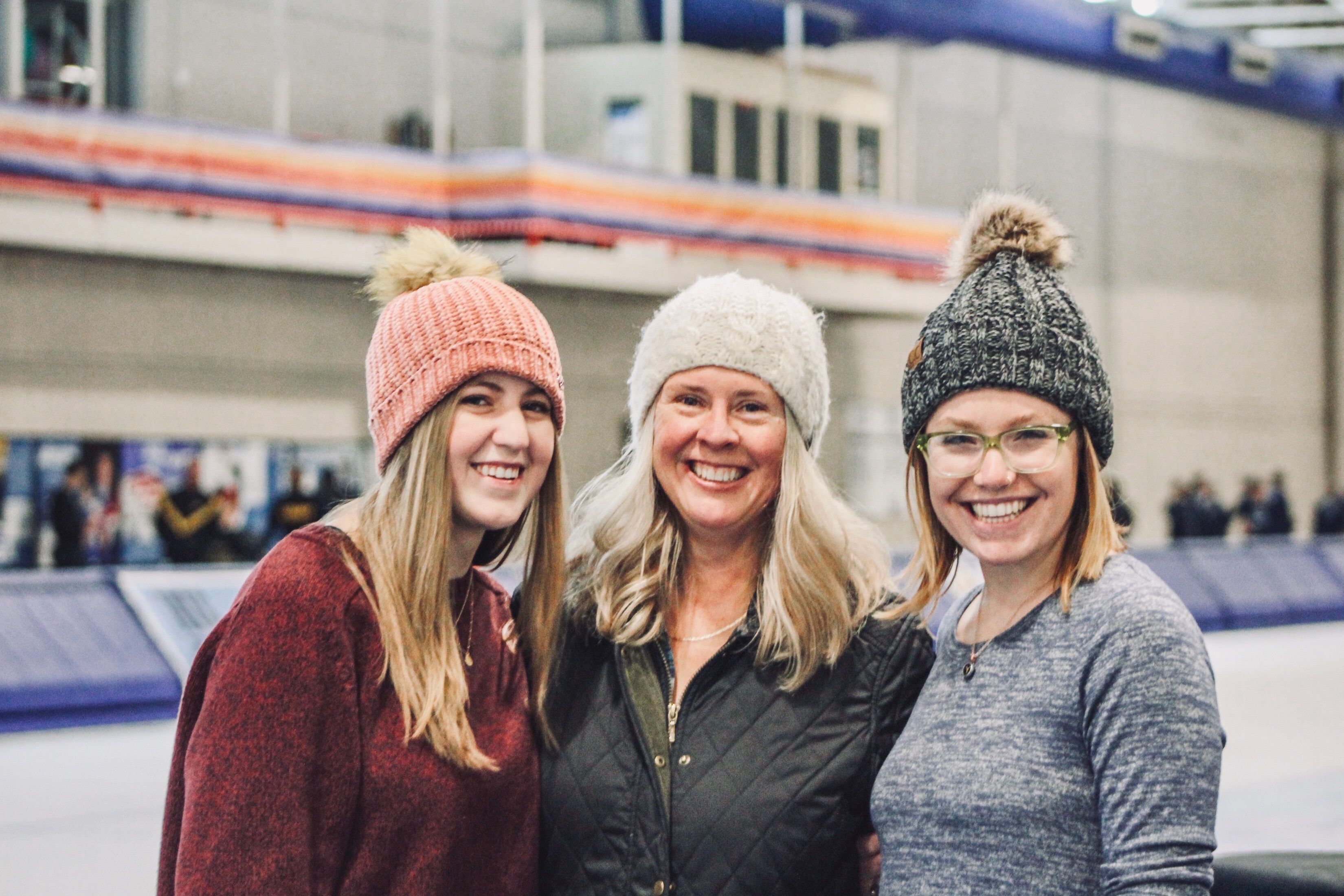 Zoë, Amy and Melania Klemowits at an ice skating rink