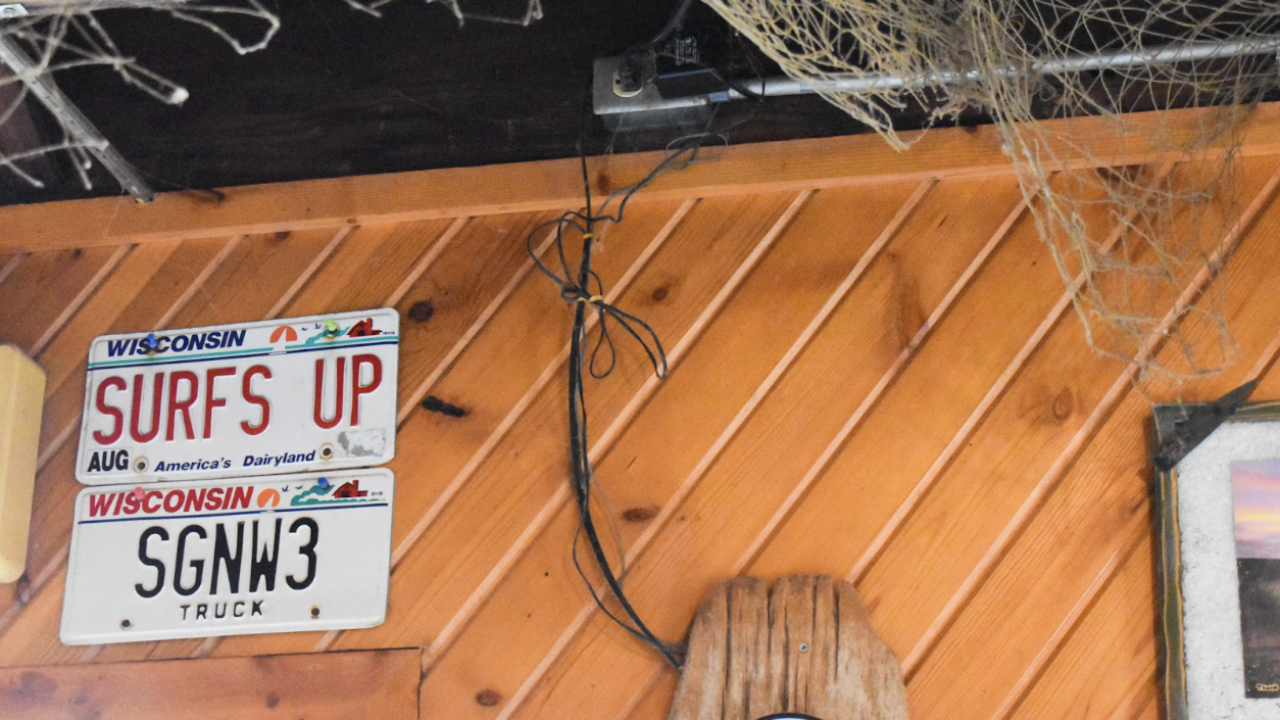 The Weather Center Cafe, owned by former Sheboygan surfer Teek, stands as a surfing community symbol with its surfing decor.